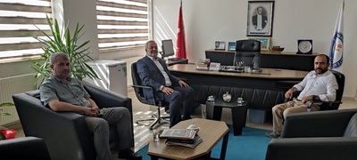 İlimiz Müftüsü Mehmet Taştan Fakültemiz Dekanı Prof. Dr. Hüseyin Güneş'i  Makamında Ziyaret Etti.